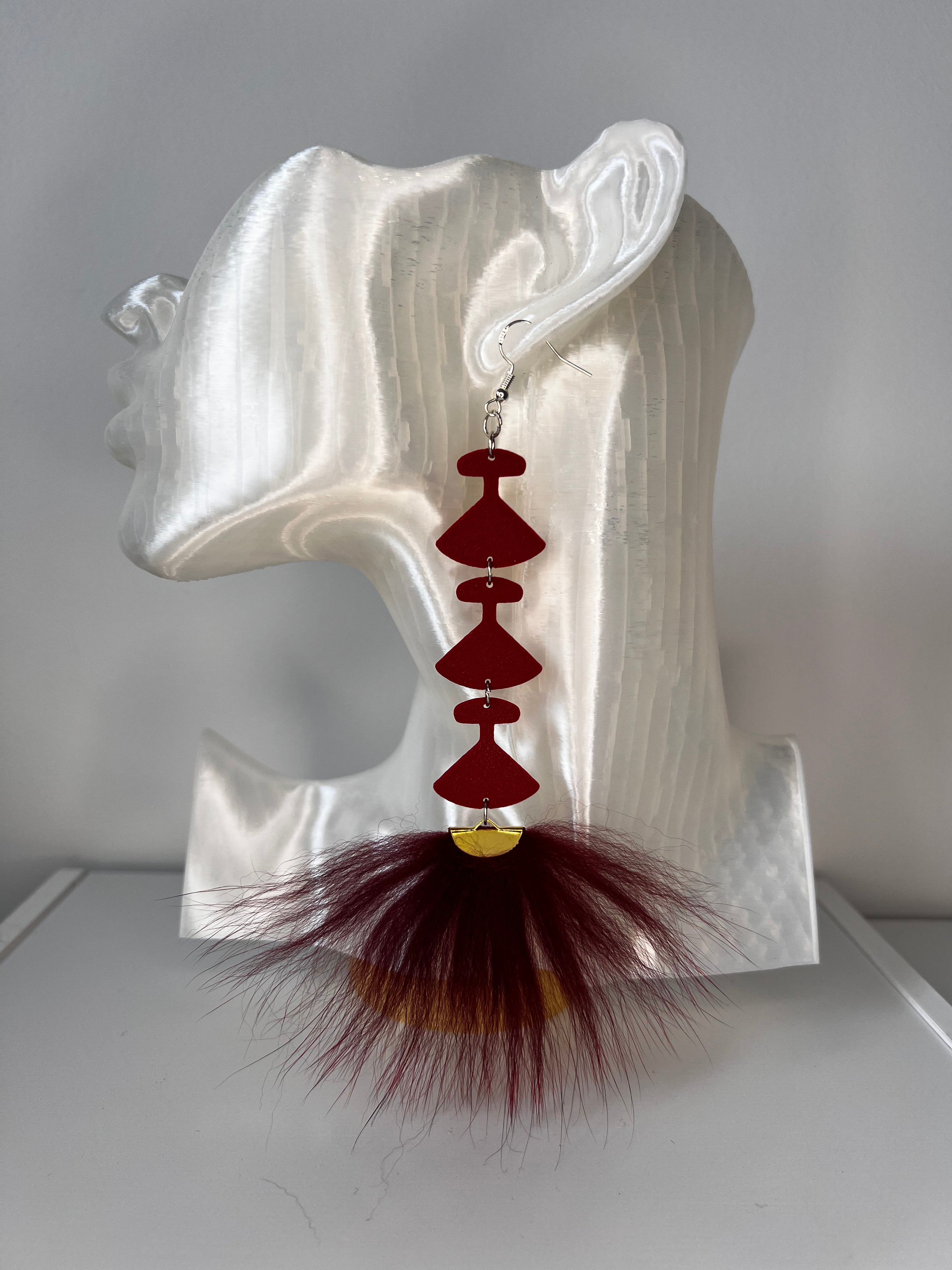 3 uluk earrings with fox fur