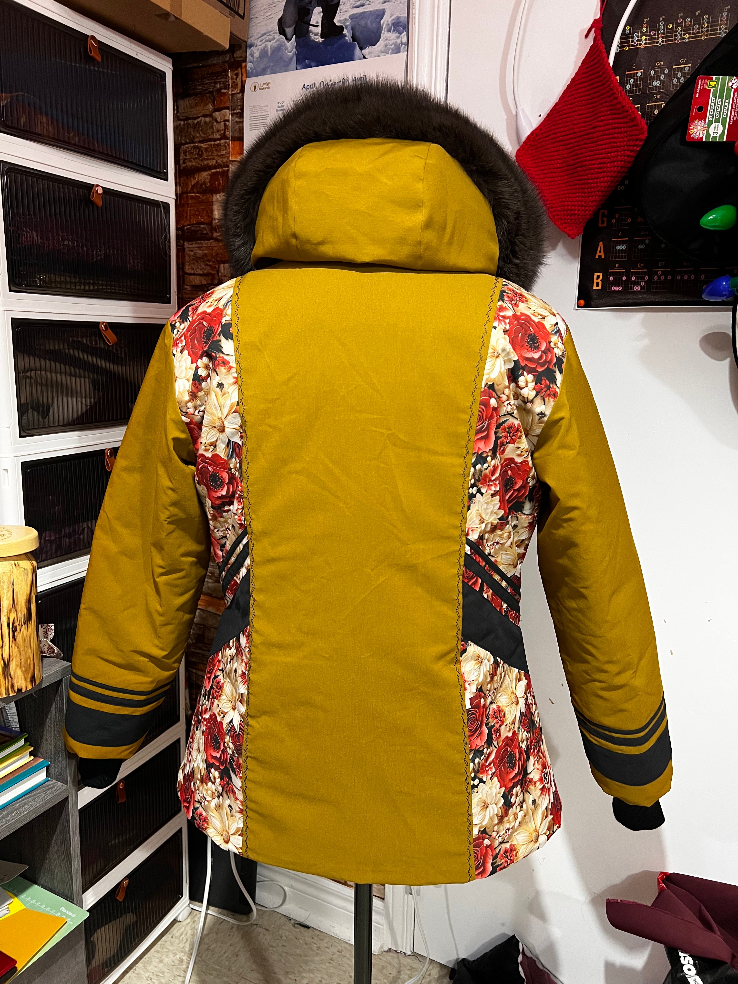 mustard yellow parka, floral designs with brown fox fur